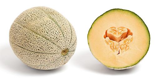 Cantaloupemelon hel och delad